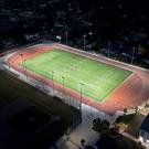 Football field with lighting and minimal spillage to the houses in proximity
